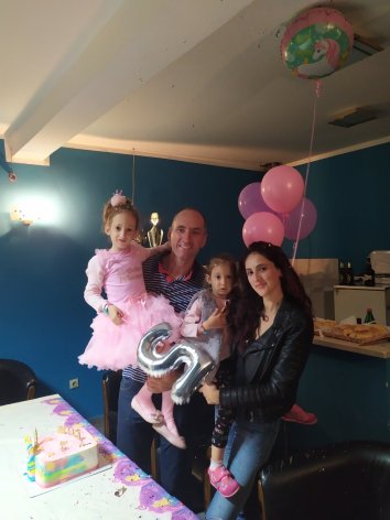 Milos with his family